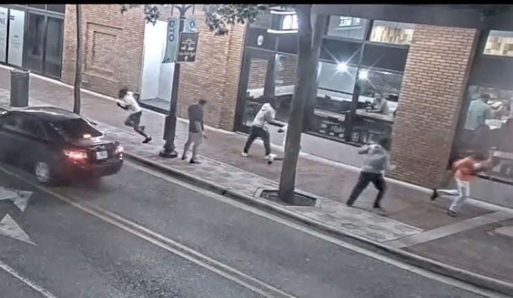 Video surveillance footage showed multiple witnesses fleeing from the suspect, Justice S. Fletcher, moments after the accidental gunshot was reportedly fired into a nearby business. (Photo: Orlando Police Department)