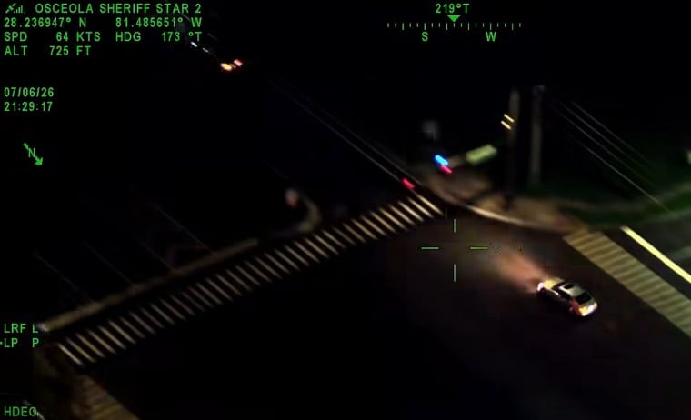 Stone Ivia Mwaki - vehicle running red light during high speed pursuit photo by osceola county sheriff s office